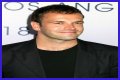 Jonny Lee Miller flashes ink for Ellen charity